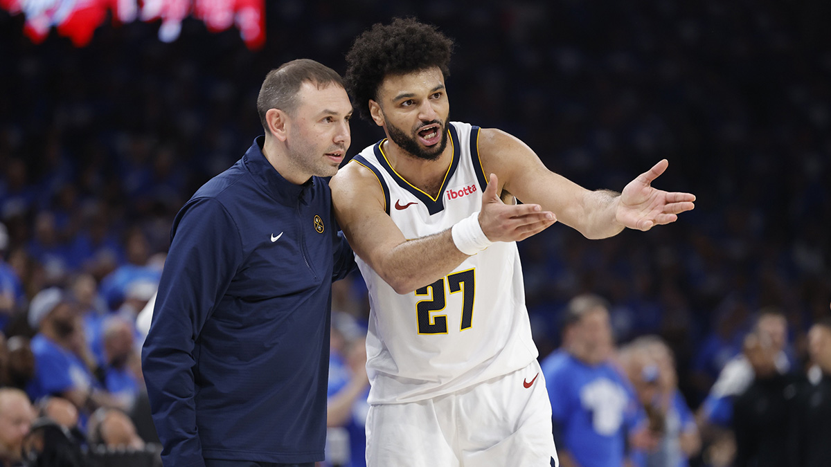 Denver Nuggets guard Jamal Murray (27) talks to head coach David Adelman in the second quarter against the Oklahoma City Thunder during game seven of the second round for the 2025 NBA Playoffs at Paycom Center.