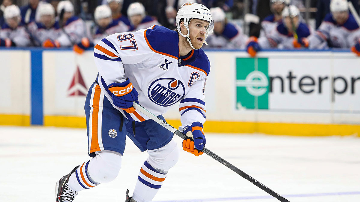 : Mar 16, 2025; New York, New York, USA; Edmonton Oilers center Connor McDavid (97) looks to pass against the New York Rangers during the first period at Madison Square Garden.