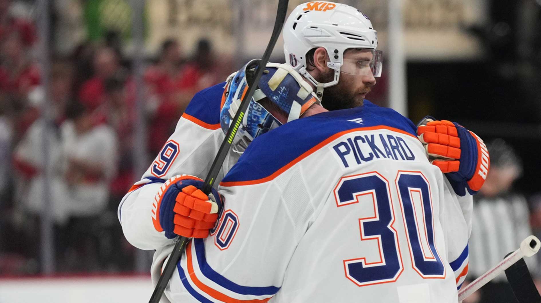 Edmonton Oilers center Leon Draisaitl (29) celebrates the win with goaltender Calvin Pickard (30) after overtime against the Florida Panthers in game four of the 2025 Stanley Cup Final at Amerant Bank Arena.