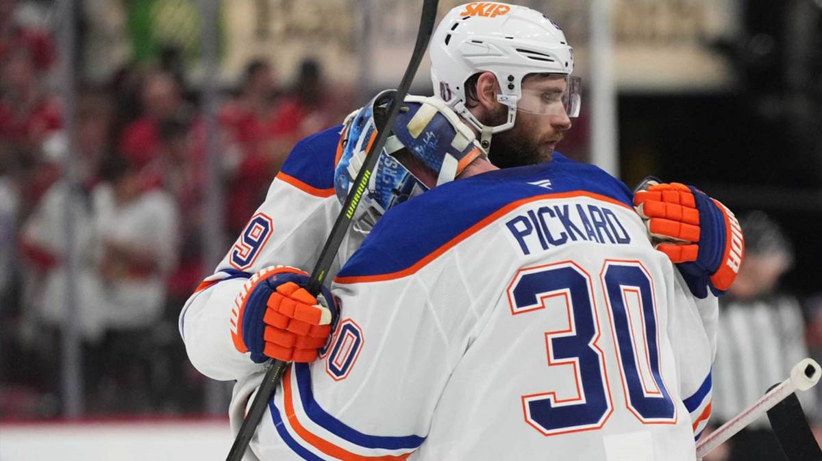 Edmonton Oilers center Leon Draisaitl (29) celebrates the win with goaltender Calvin Pickard (30) after overtime against the Florida Panthers in game four of the 2025 Stanley Cup Final at Amerant Bank Arena.