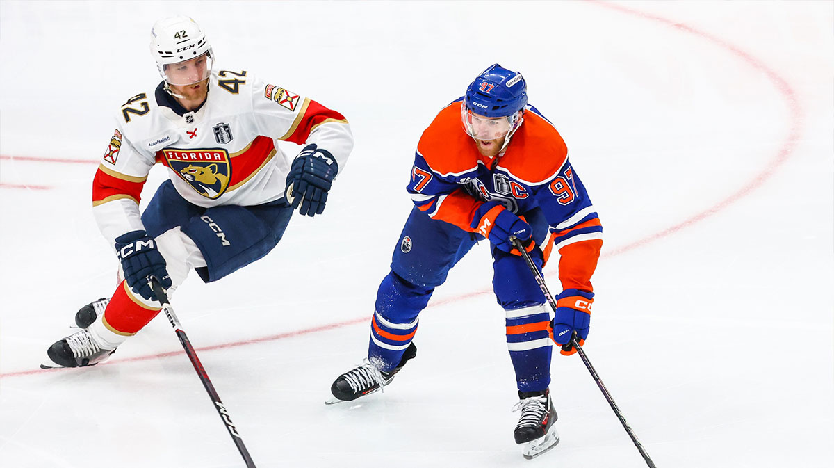 Edmonton Oilers center Connor McDavid (97) controls the puck against Florida Panthers defenseman Gustav Forsling (42) during the third period in game five of the 2025 Stanley Cup Final at Rogers Place.