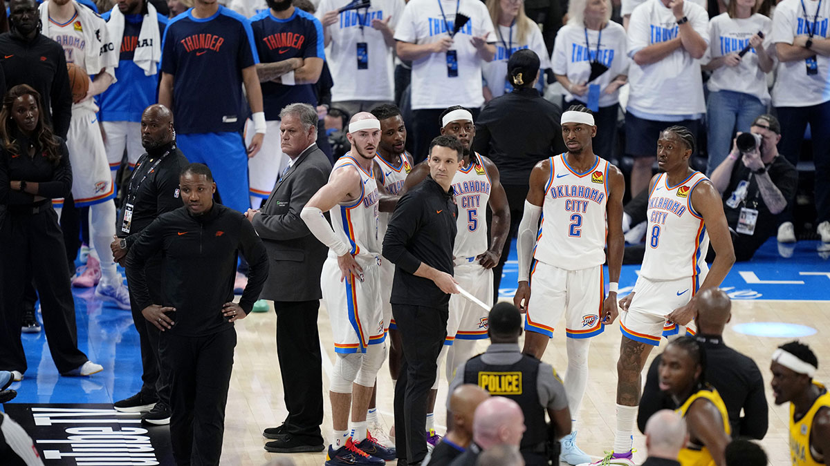 The Oklahoma City Thunder during a timeout during the fourth quarter in game one of the 2025 NBA Finals against the Indiana Pacers at Paycom Center. Mandatory Credit: