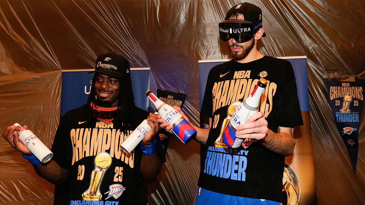 Oklahoma City Thunder guard Luguentz Dort (5) and forward Chet Holmgren (7) celebrate after winning game seven of the 2025 NBA Finals against the Indiana Pacers at Paycom Center.