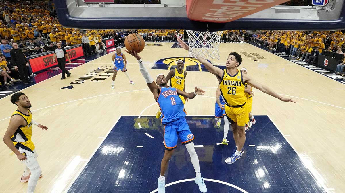 Oklahoma City Thunder guard Shai Gilgeous-Alexander (2) shoots the ball against Indiana Pacers guard Ben Sheppard (26) during the second half of game six of the 2025 NBA Finals between the Oklahoma City Thunder and the Indiana Pacers at Gainbridge Fieldhouse.