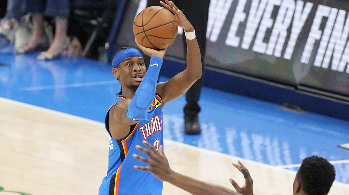 Oklahoma City Thunder guard Shai Gilgeous-Alexander (2) shoots the ball against Indiana Pacers center Thomas Bryant (3) during the second half during game two of the 2025 NBA Finals at Paycom Center.