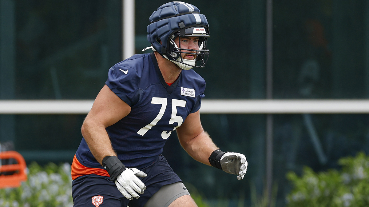 Chicago Bears offensive tackle Ozzy Trapilo (75) warms up during minicamp at Halas Hall.