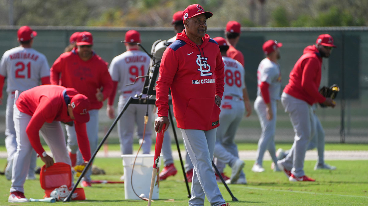 St. Louis Cardinals legend Ozzie Smith looks over infield practice at spring training.