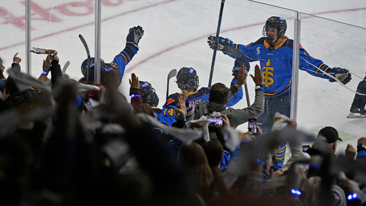 PWHL Toronto Sceptres forward Jesse Compher (18) joins team mates and fans as they celebrate a goal scored by forward Hannah Miller (34) against the Boston Fleet in the third period at Coca-Cola Coliseum.