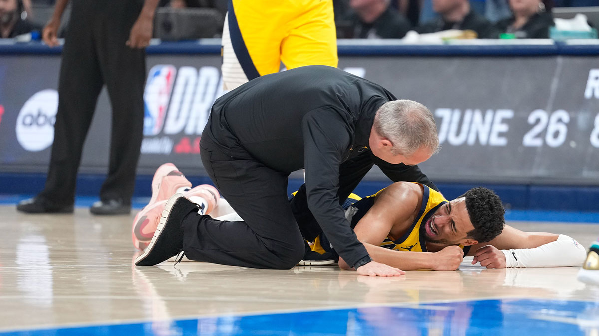 Indiana Pacers guard Tyrese Haliburton (0) reacts after suffering an injury during the first quarter against the Oklahoma City Thunder during game seven of the 2025 NBA Finals at Paycom Center.