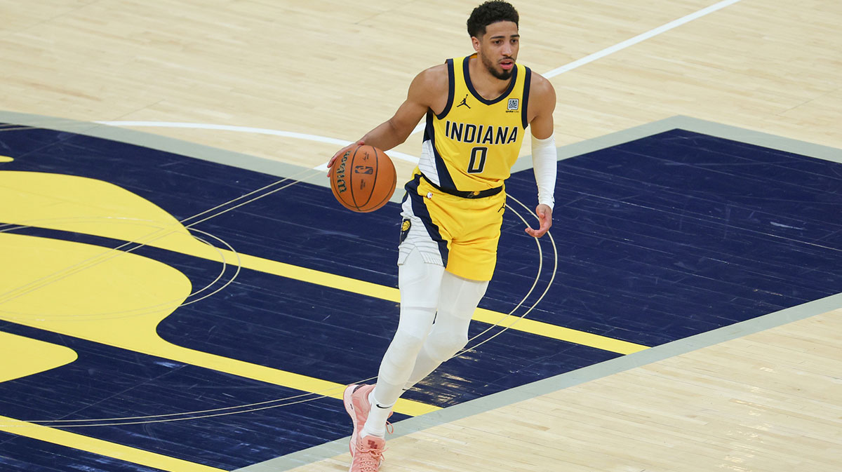 Indiana Pacers guard Tyrese Haliburton (0) dribbles the ball against the Oklahoma City Thunder in the second quarter during game six of the 2025 NBA Finals at Gainbridge Fieldhouse.