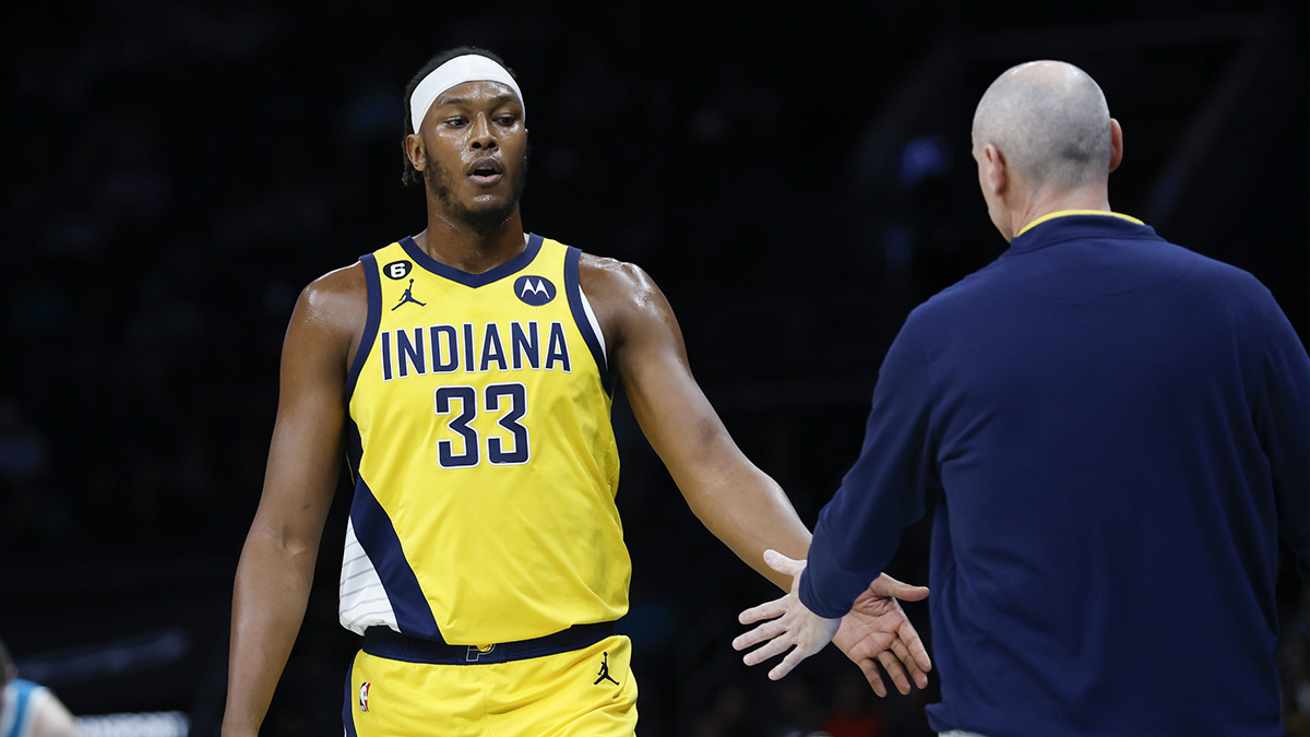 Pacers center Myles Turner (33) slaps hands with Indiana Pacers head coach Rick Carlisle as he goes to the bench during the first half against the Charlotte Hornets at Spectrum Center