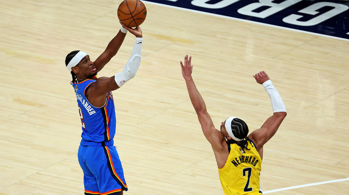 Thunder guard Shai Gilgeous-Alexander (2) shoots the ball against Indiana Pacers guard Andrew Nembhard (2) during the fourth quarter in game three of the 2025 NBA Finals at Gainbridge Fieldhouse.
