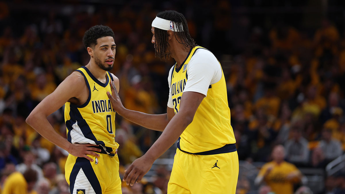 Pacers guard Tyrese Haliburton (0) and center Myles Turner (33) talk during the third quarter of game three of the eastern conference finals for the 2025 NBA Playoffs at Gainbridge Fieldhouse
