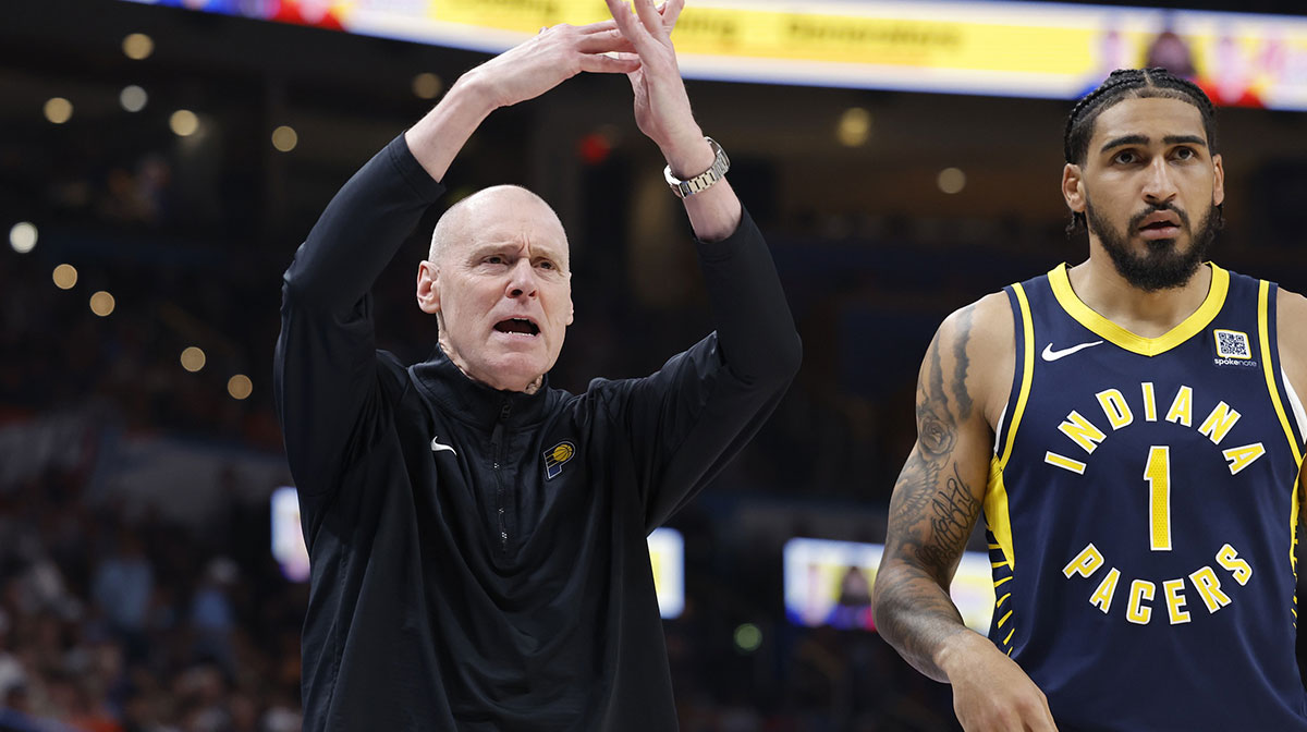Pacers head coach Rick Carlisle calls a time out against the Oklahoma City Thunder during the second quarter at Paycom Center with Thunder head coach Mark Daigneault in the background