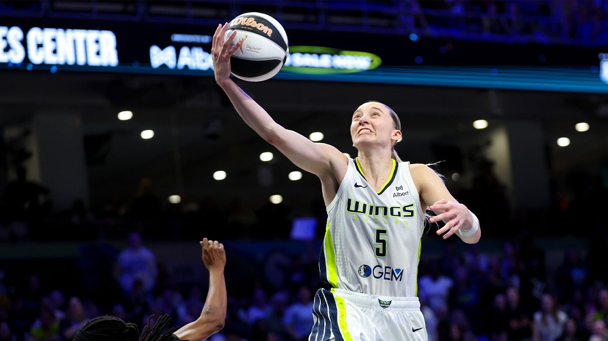 Dallas Wings guard Paige Bueckers (5) shoots past Golden State Valkyries guard Tiffany Hayes (15) during the second half at College Park Center.