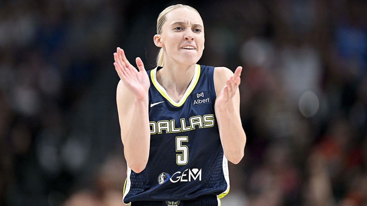 Dallas Wings guard Paige Bueckers (5) celebrates during the second half against the Indiana Fever at the American Airlines Center.