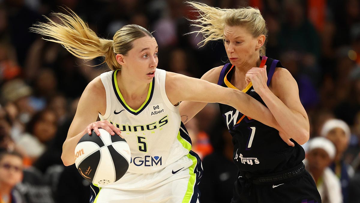 Dallas Wings guard Paige Bueckers (5) against Phoenix Mercury guard Lexi Held (1) in the first half at PHX Arena.