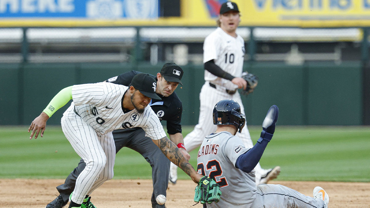 Detroit Tigers center fielder Parker Meadows (22) steals the second base against Chicago White Sox second baseman Lenyn Sosa (50) during the second inning at Rate Field.