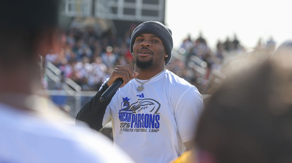 Dallas Cowboys linebacker Micah Parsons speaks to campers at the Micah Parsons Lions Den Football Camp at St. John Paul II High School in Corpus Christi, Texas, on Saturday, March 15, 2025.