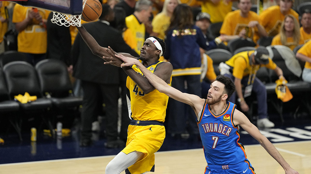 Indiana Pacers forward Pascal Siakam (43) drives to the hoop past Oklahoma City Thunder forward Chet Holmgren (7) during the third quarter of game four of the 2025 NBA Finals at Gainbridge Fieldhouse.
