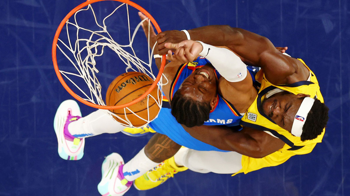 Indiana Pacers forward Pascal Siakam (43) dunks against Oklahoma City Thunder forward Jalen Williams (8) during the third quarter during game six of the 2025 NBA Finals at Gainbridge Fieldhouse.