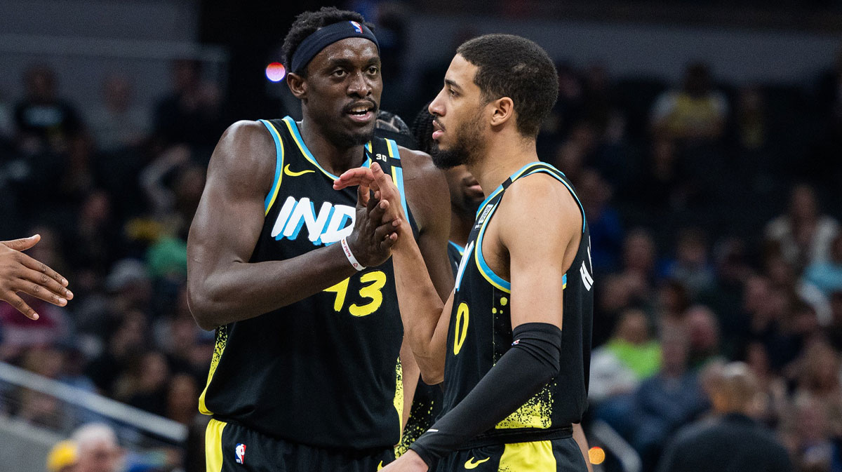Indiana Pacers forward Pascal Siakam (43) celebrates with guard Tyrese Haliburton (0) in the first half against the Brooklyn Nets at Gainbridge Fieldhouse.