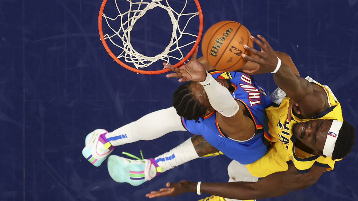 Indiana Pacers forward Pascal Siakam (43) dunks against Oklahoma City Thunder forward Jalen Williams (8) during the third quarter during game six of the 2025 NBA Finals at Gainbridge Fieldhouse.
