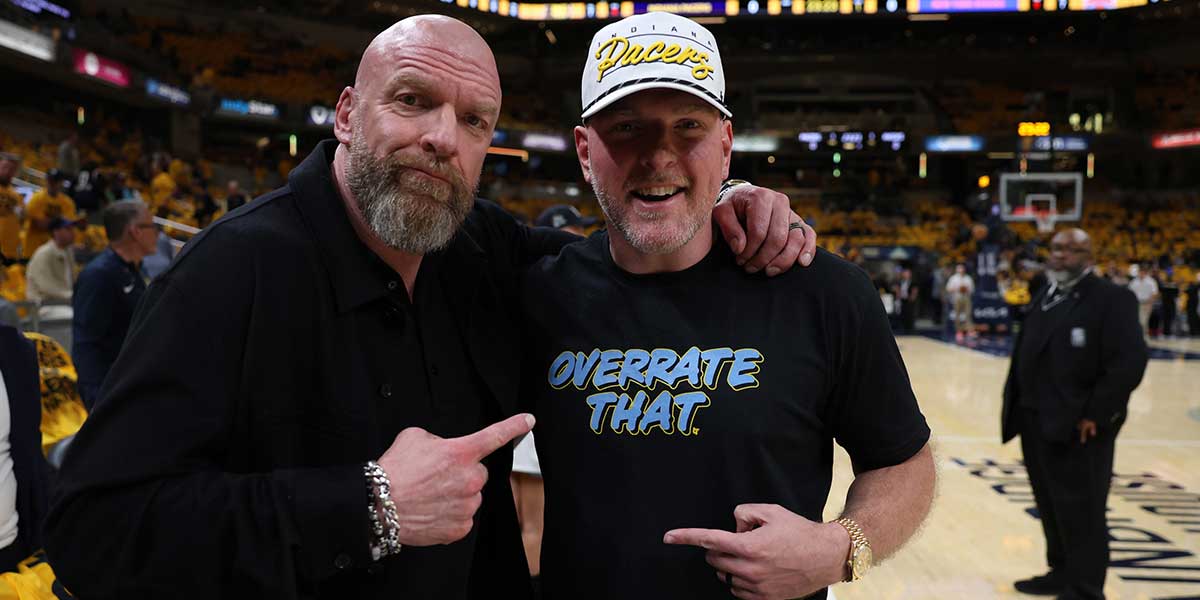 Paul Michael Levesque, known professionally as Triple H, and Pat McAfee pose for a photo prior to game four of the eastern conference finals between the Indiana Pacers and the New York Knicks for the 2025 NBA Playoffs at Gainbridge Fieldhouse.