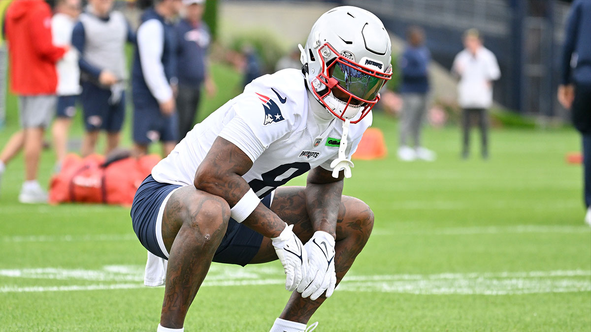 New England Patriots wide receiver Stefon Diggs (8) stretches during minicamp at Gillette Stadium.
