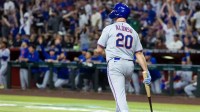 May 5, 2025; Phoenix, Arizona, USA; New York Mets first baseman Pete Alonso reacts after hitting a home run against the Arizona Diamondbacks at Chase Field. Mandatory Credit: Mark J. Rebilas-Imagn Images