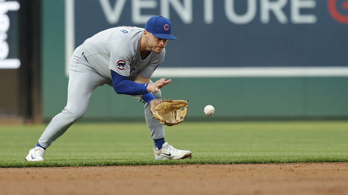 Chicago Cubs outfielder Pete Crow-Armstrong (4) fields a ground ball by Washington Nationals shortstop Nasim Nuñez (not pictured) during the third inning at Nationals Park.