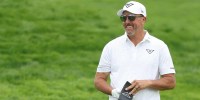 Phil Mickelson smiles on the tenth fairway during a practice round for the U.S. Open golf tournament at Oakmont Country Club.