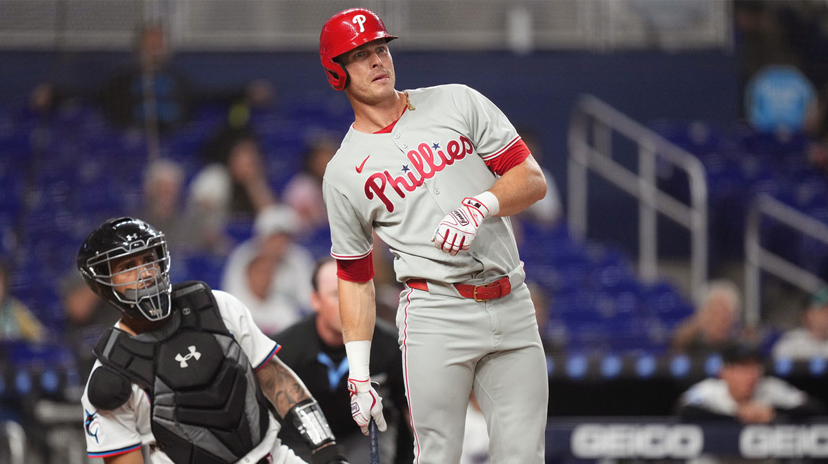 Philadelphia Phillies left fielder Max Kepler (17) looks to see if he hit the ball fair or foul in the fourth inning as Miami Marlins catcher Agustín Ramírez (50) looks on at loanDepot Park. Kemp Mattingly