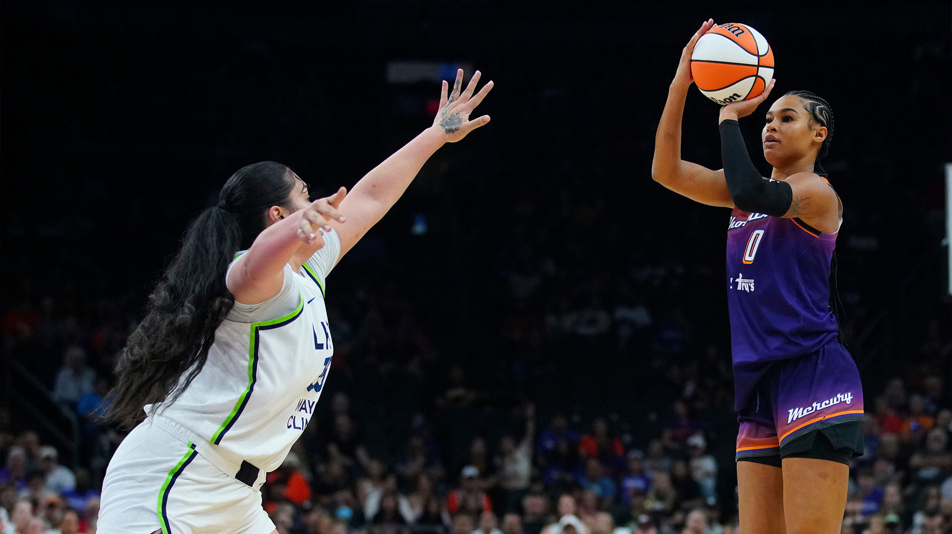 Mercury forward Satou Sabally (0) shoots against Lynx forward Allissa Pili (35) at PHX Arena in Phoenix, on May 30, 2025.