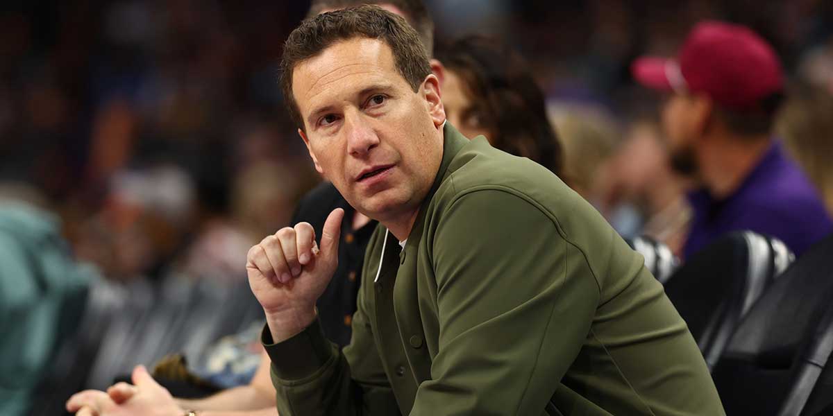 Phoenix Suns owner Mat Ishbia sits courtside against the Indiana Pacers at Footprint Center.