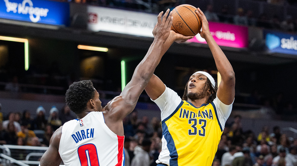 Indiana Pacers center Myles Turner (33) shoots the ball while Detroit Pistons center Jalen Duren (0) defends in the first half at Gainbridge Fieldhouse.