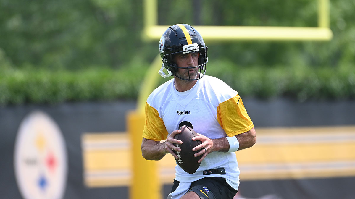 Pittsburgh Steelers quarterback Aaron Rodgers (8) drops back to pass during minicamp at their South Side facility.
