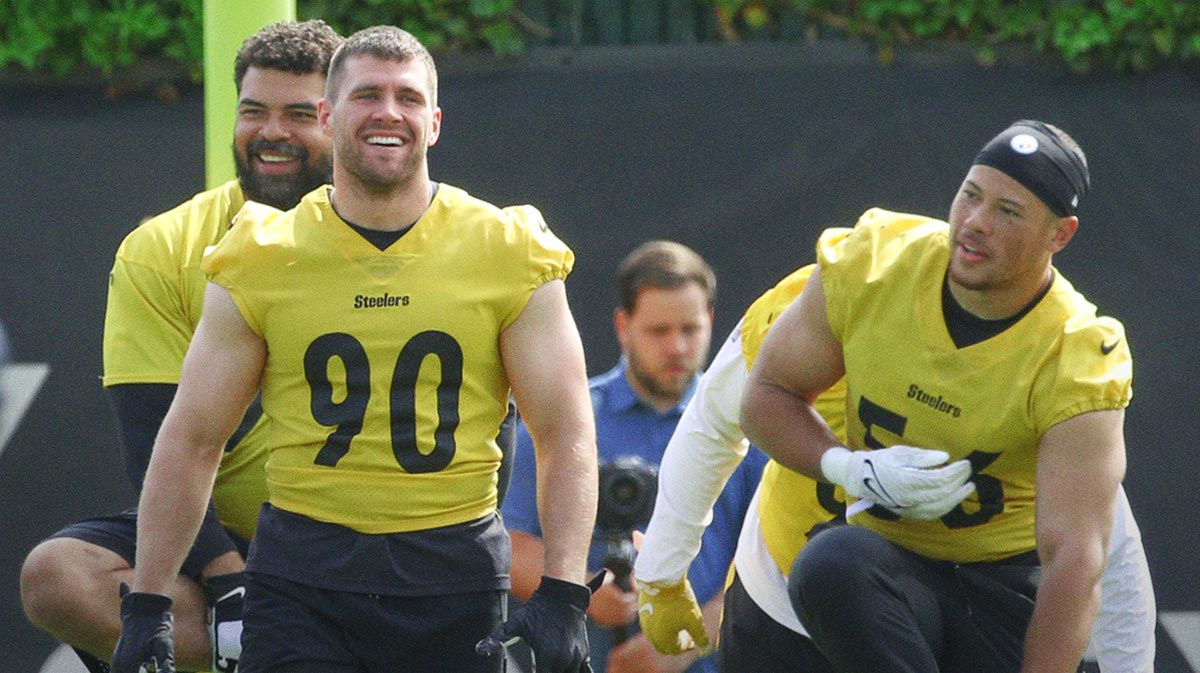 Pittsburgh Steelers defensive end Cameron Hayward (rear) and linebackers TJ Watt (90) and Alex Highsmith (56) participate in organized team activities at UPMC Rooney Sports Complex.
