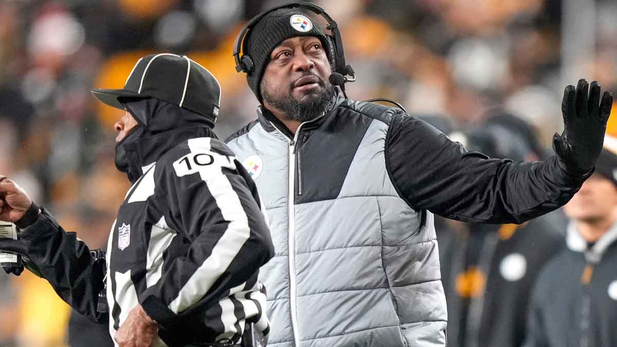 Pittsburgh Steelers head coach Mike Tomlin sets up a timeout in the second quarter of the NFL Week 18 game between the Pittsburgh Steelers and the Cincinnati Bengals at Acrisure Stadium in Pittsburgh on Saturday, Jan. 4, 2025.