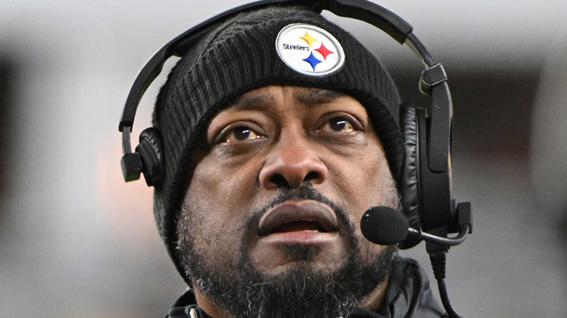 Pittsburgh Steelers head coach Mike Tomlin looks at the scoreboard against the Cincinnati Bengals during the second quarter at Acrisure Stadium.