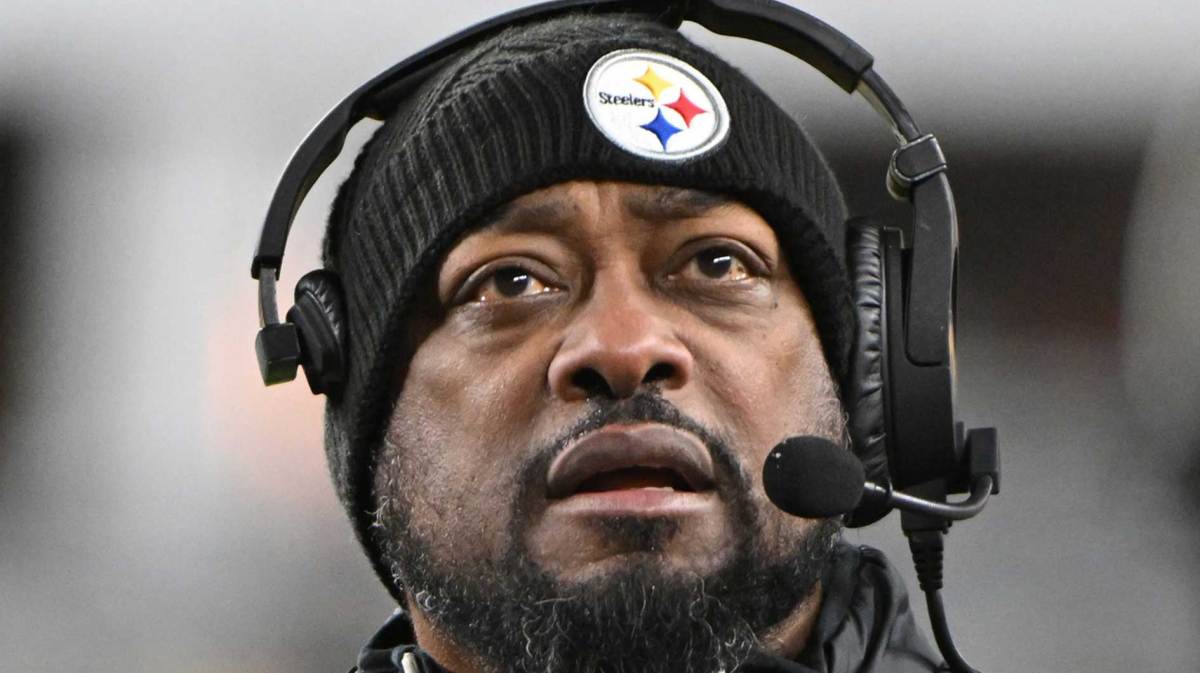 Pittsburgh Steelers head coach Mike Tomlin looks at the scoreboard against the Cincinnati Bengals during the second quarter at Acrisure Stadium.