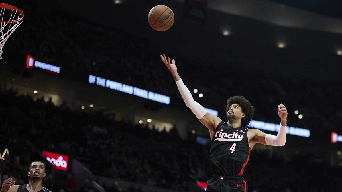 Portland Trail Blazers guard Matisse Thybulle (4) grabs a rebound during the second half against the Boston Celtics at Moda Center.