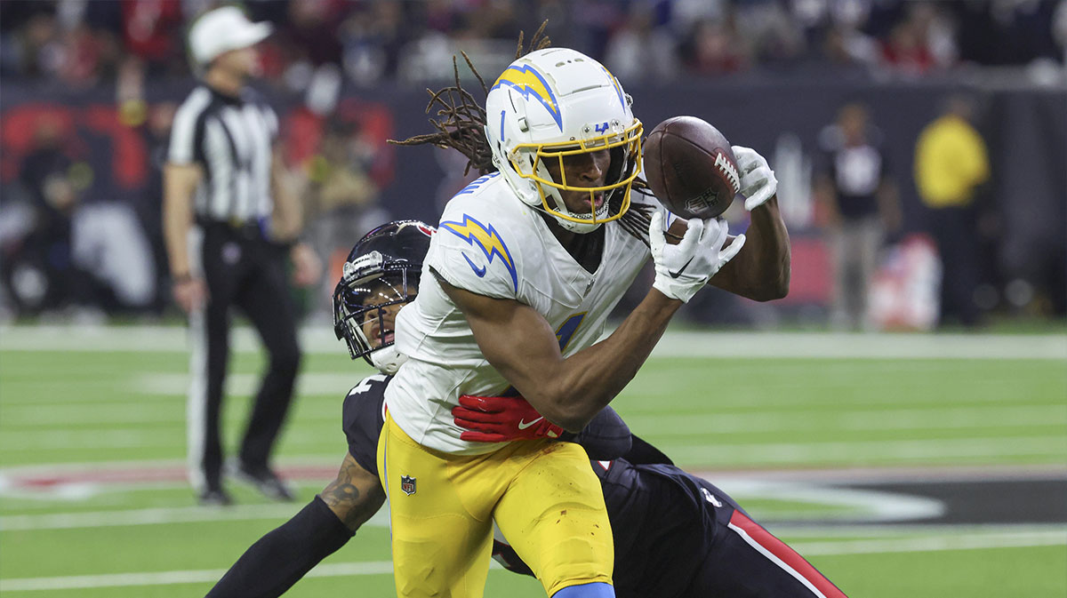 Houston Texans cornerback Derek Stingley Jr. (24) defends as Los Angeles Chargers wide receiver Quentin Johnston (1) attempts to make a reception during the game in an AFC wild card game at NRG Stadium. Mandatory Credit: Troy Taormina-Imagn Images