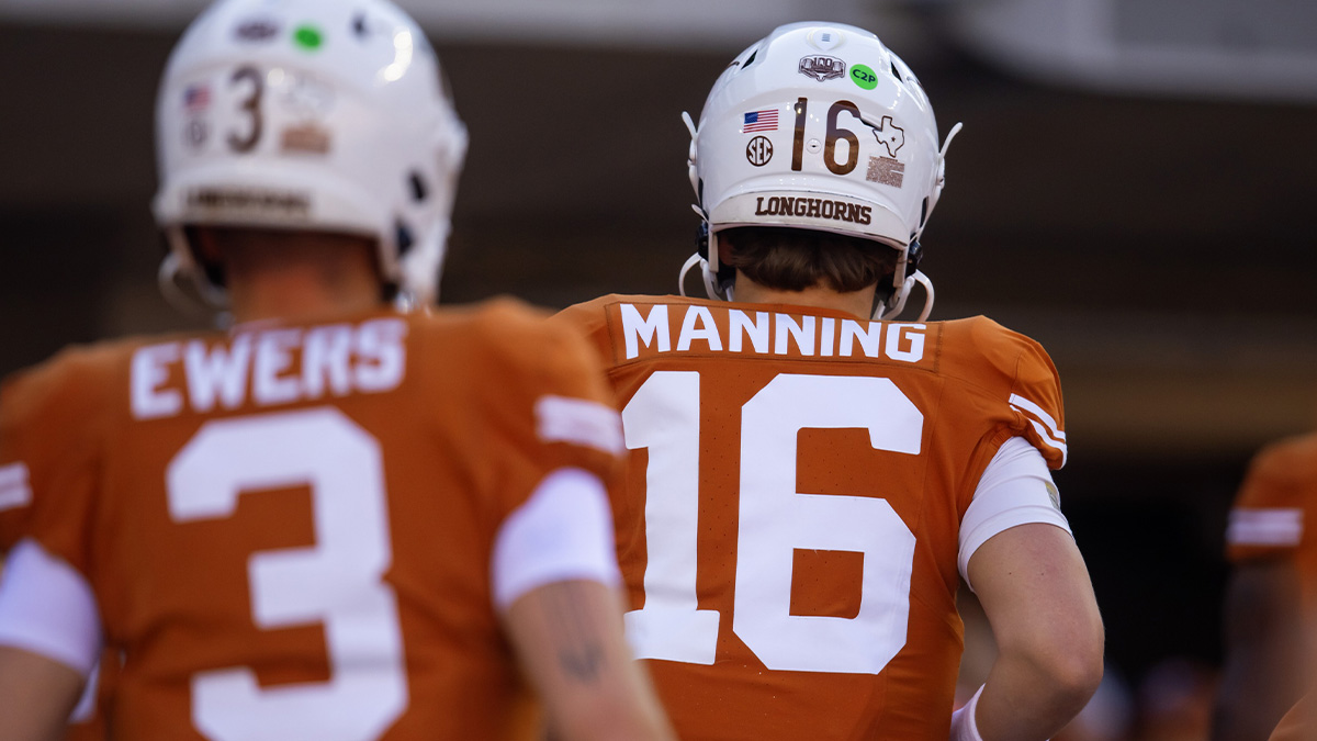 Texas Longhorns quarterback Arch Manning (16) and Quinn Ewers (3) against the Clemson Tigers during the CFP National playoff first round at Darrell K Royal-Texas Memorial Stadium.