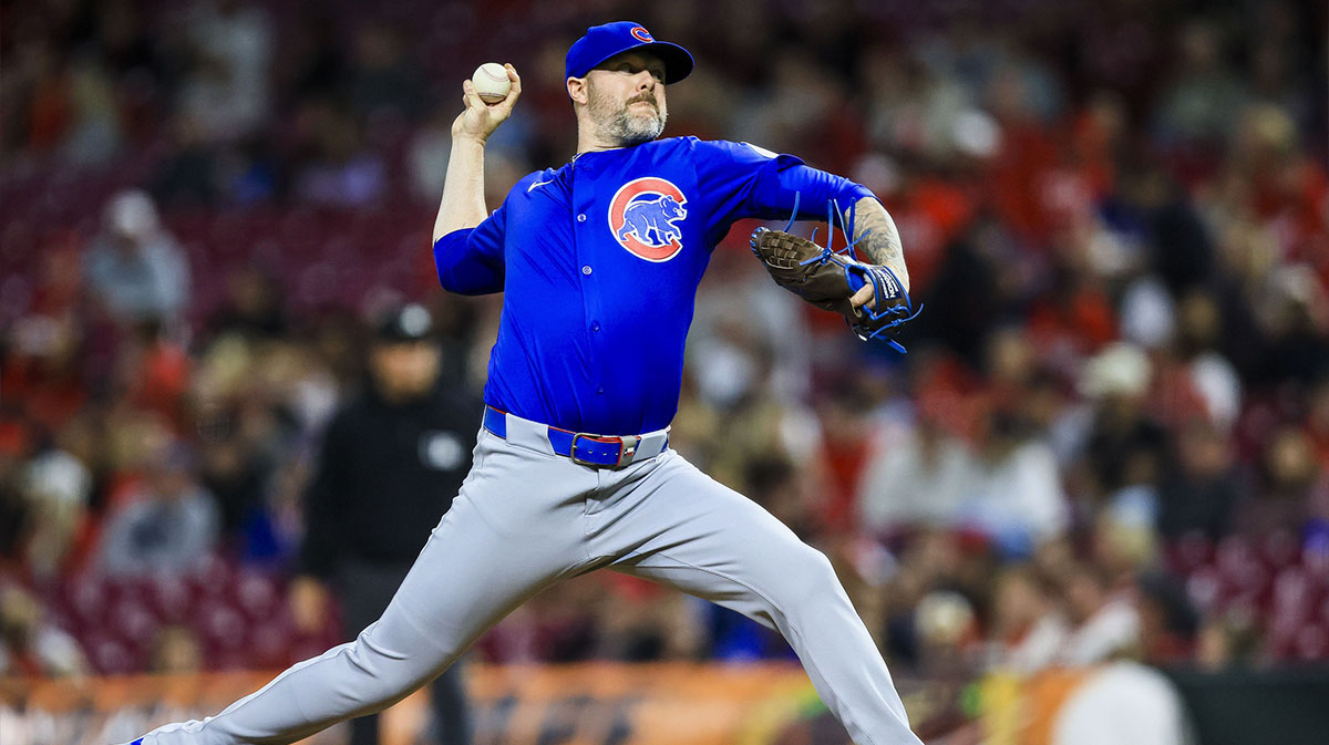 Chicago Cubs relief pitcher Ryan Pressly (55) pitches against the Cincinnati Reds in the ninth inning at Great American Ball Park.