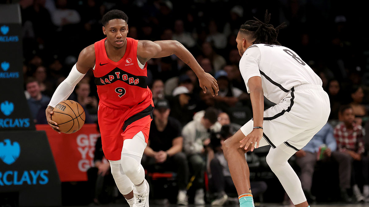 Toronto Raptors guard RJ Barrett (9) brings the ball up court against Brooklyn Nets forward Ziaire Williams (8) during the fourth quarter at Barclays Center.