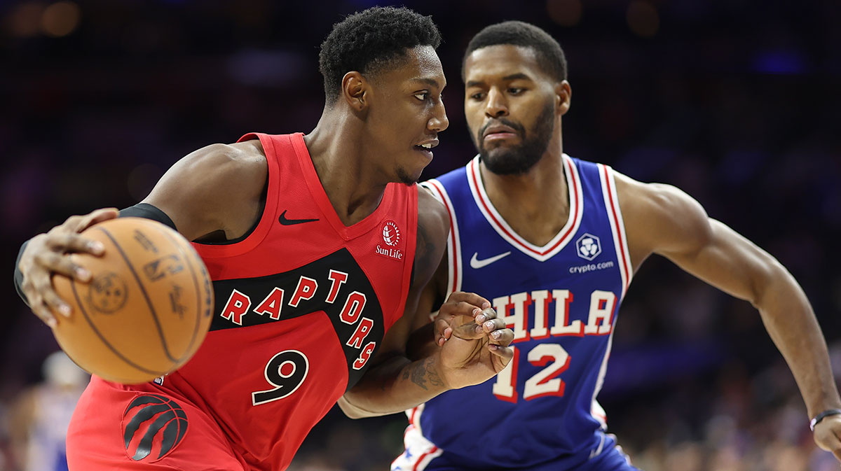 Toronto Raptors guard RJ Barrett (9) drives against Philadelphia 76ers guard Jared Butler (12) during the fourth quarter at Wells Fargo Center.