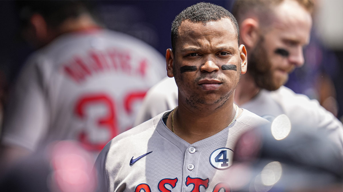 Boston Red Sox designated hitter Rafael Devers (11) shown in the dugout before the game against the Atlanta Braves at Truist Park.