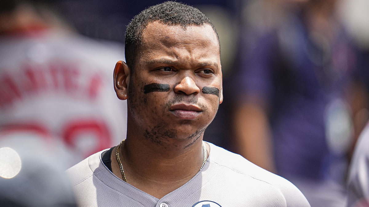 Boston Red Sox designated hitter Rafael Devers (11) shown in the dugout before the game against the Atlanta Braves at Truist Park.