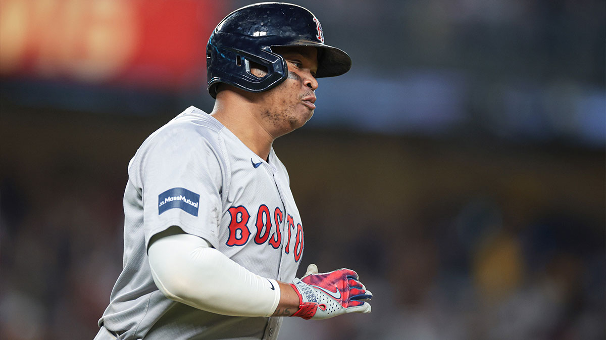 Boston Red Sox third baseman Rafael Devers (11) runs the bases during his solo home run during the ninth inning against the New York Yankees at Yankee Stadium